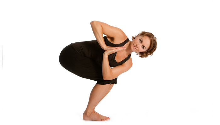 yoga chair pose to increase Metabolism